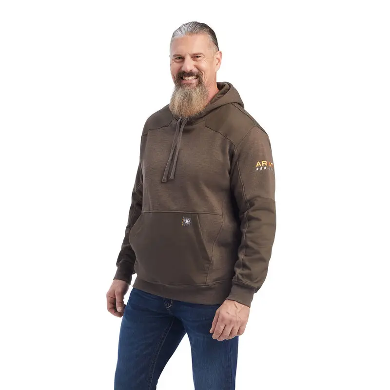 A person wearing a brown color sweatshirt and smiling
